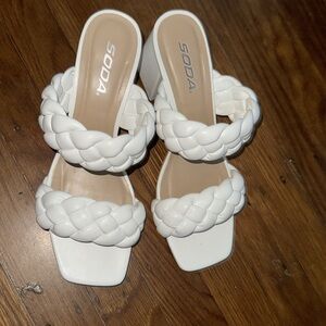 White heeled sandals